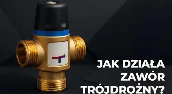 Mosiężny zawór trójdrożny podłogówka z czarną rączką regulacyjną. Dowiedz się, jak działa ten kluczowy element systemu grzewczego.